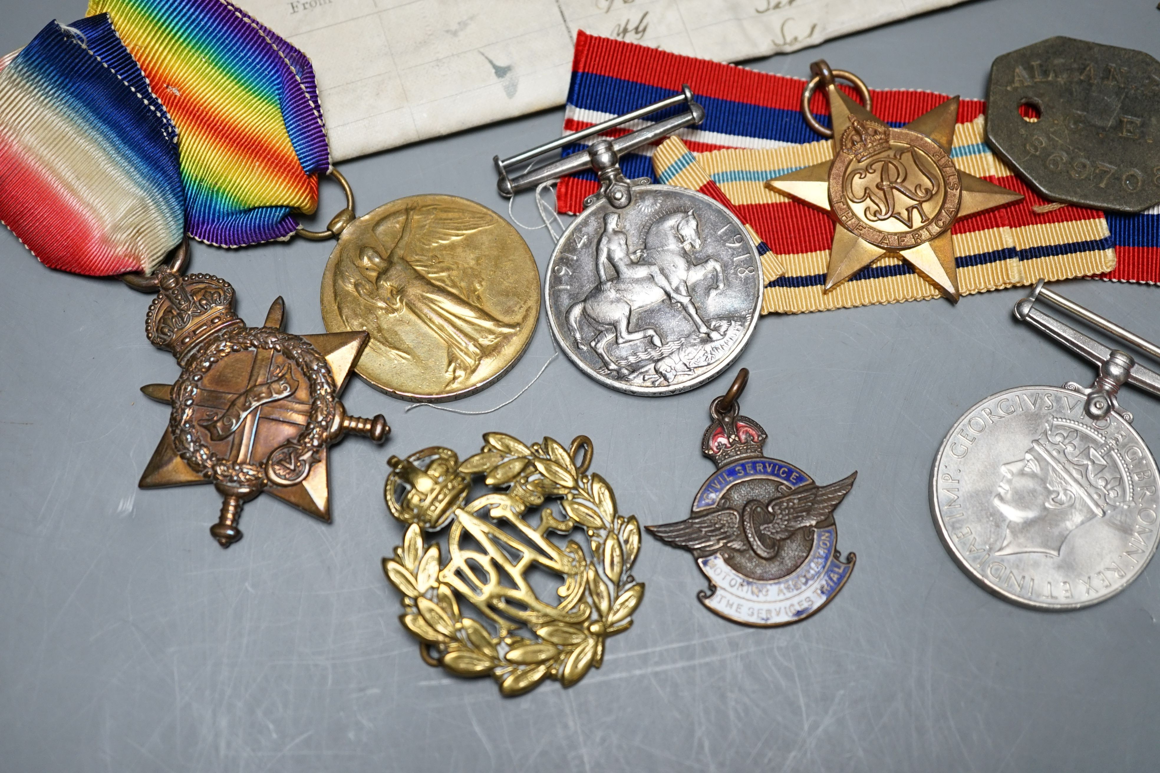 A WWI medal trio awarded to J. 11048 F. P. SHARMAN. A.B. R.N., a George V Royal Navy long service and good conduct medal awarded to M.38014 F. P. SHARMAN. R. P O. H.M.S. REPULSE, a WWI miniature dress medal group, a WWII